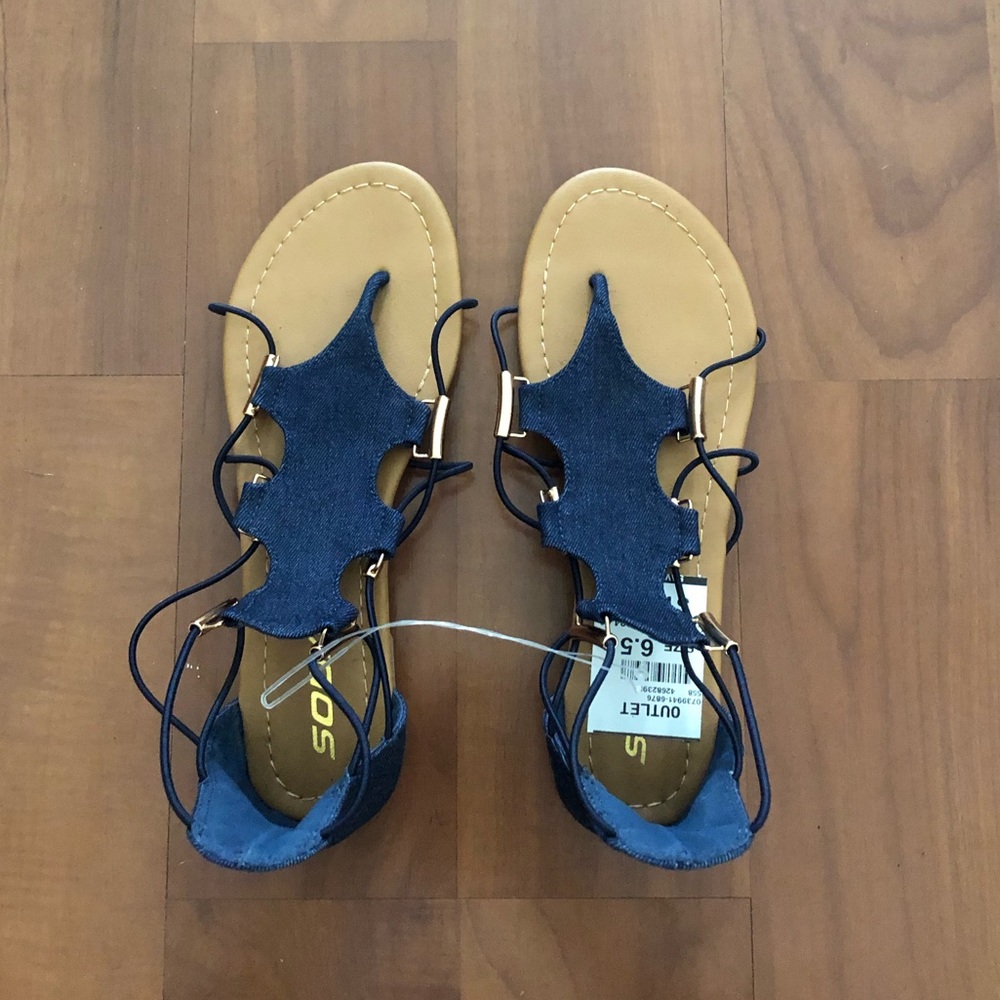 "Soda" brand. Denim and gold accent sandals